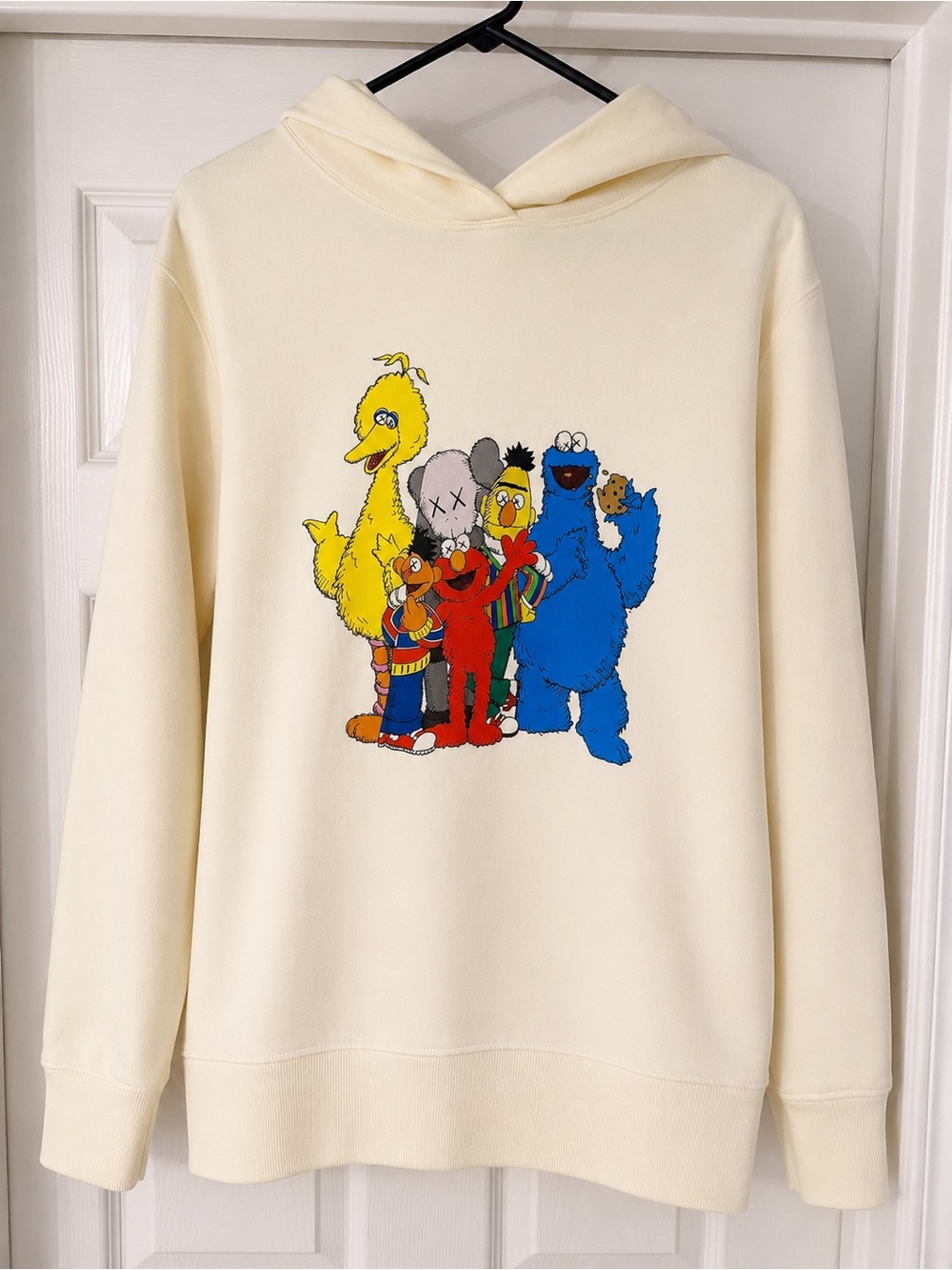 KAWS Cream Crewneck with Multicolor Sesame Street Graphic